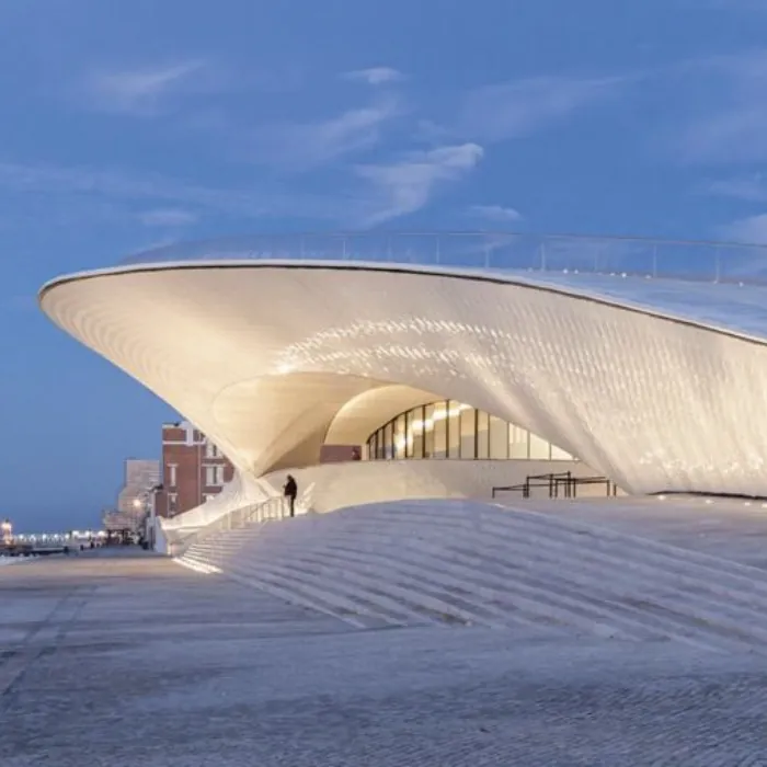 The MAAT museum beside the Tagus, at dusk.